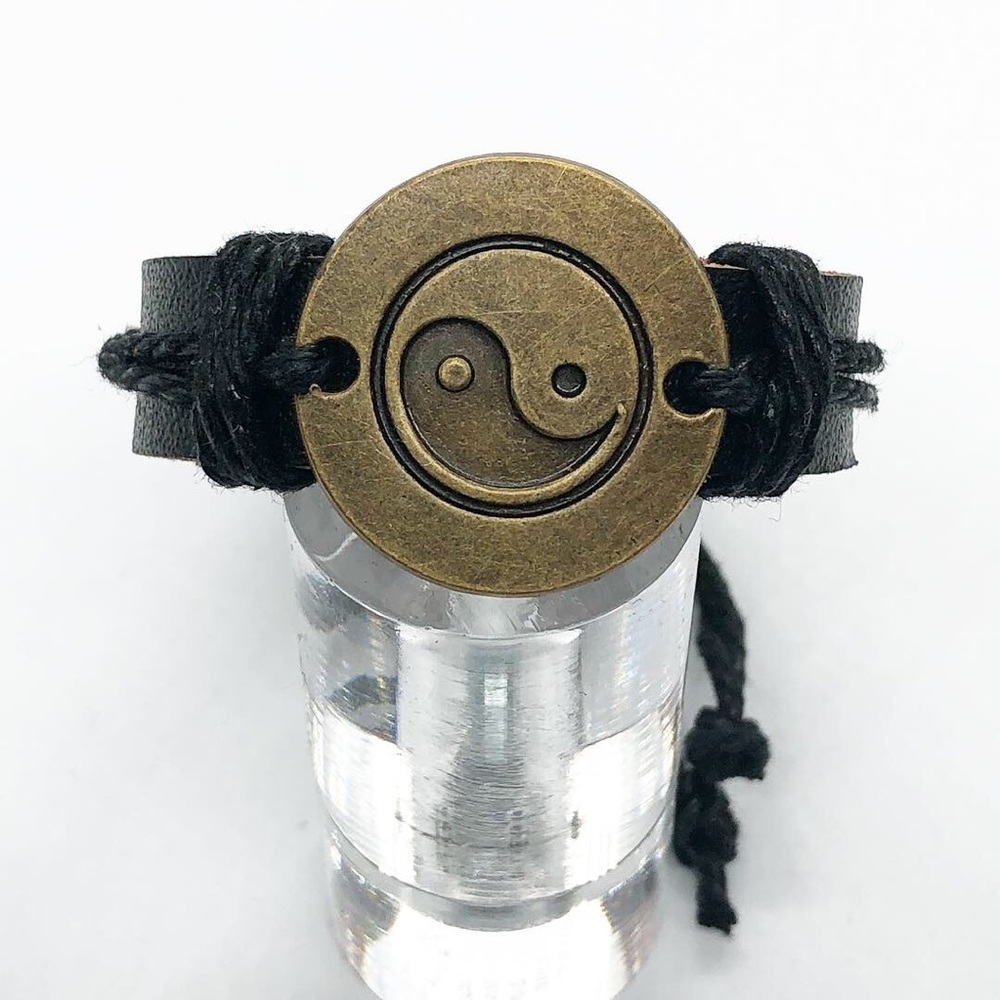 Black leather bracelet.